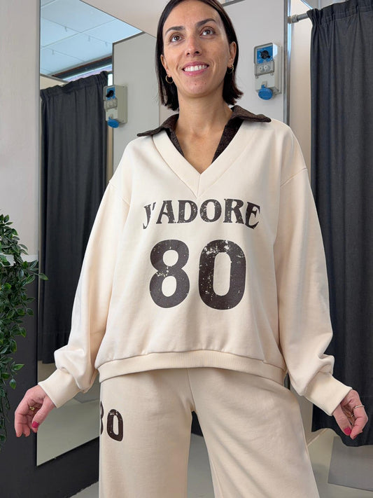 over con scollo a "v" e scritta KXMA2433NOCCIOLA KIKISIX